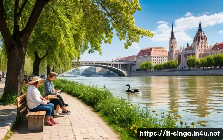 싱가포르 한강처럼 넓은 강 - A vibrant urban riverside scene in a European city like Budapest along the Danube River during a sun...